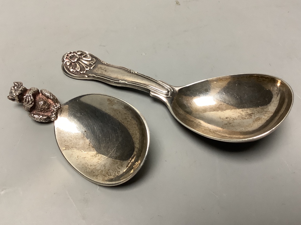 A modern silver caddy spoon, with squirrel handle, by Brian Leslie Fuller, London, 1985, 65mm and a George IV silver caddy spoon, London, 1825.